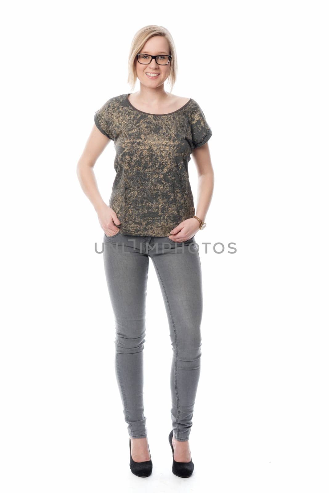 Young woman with glasses in jeans