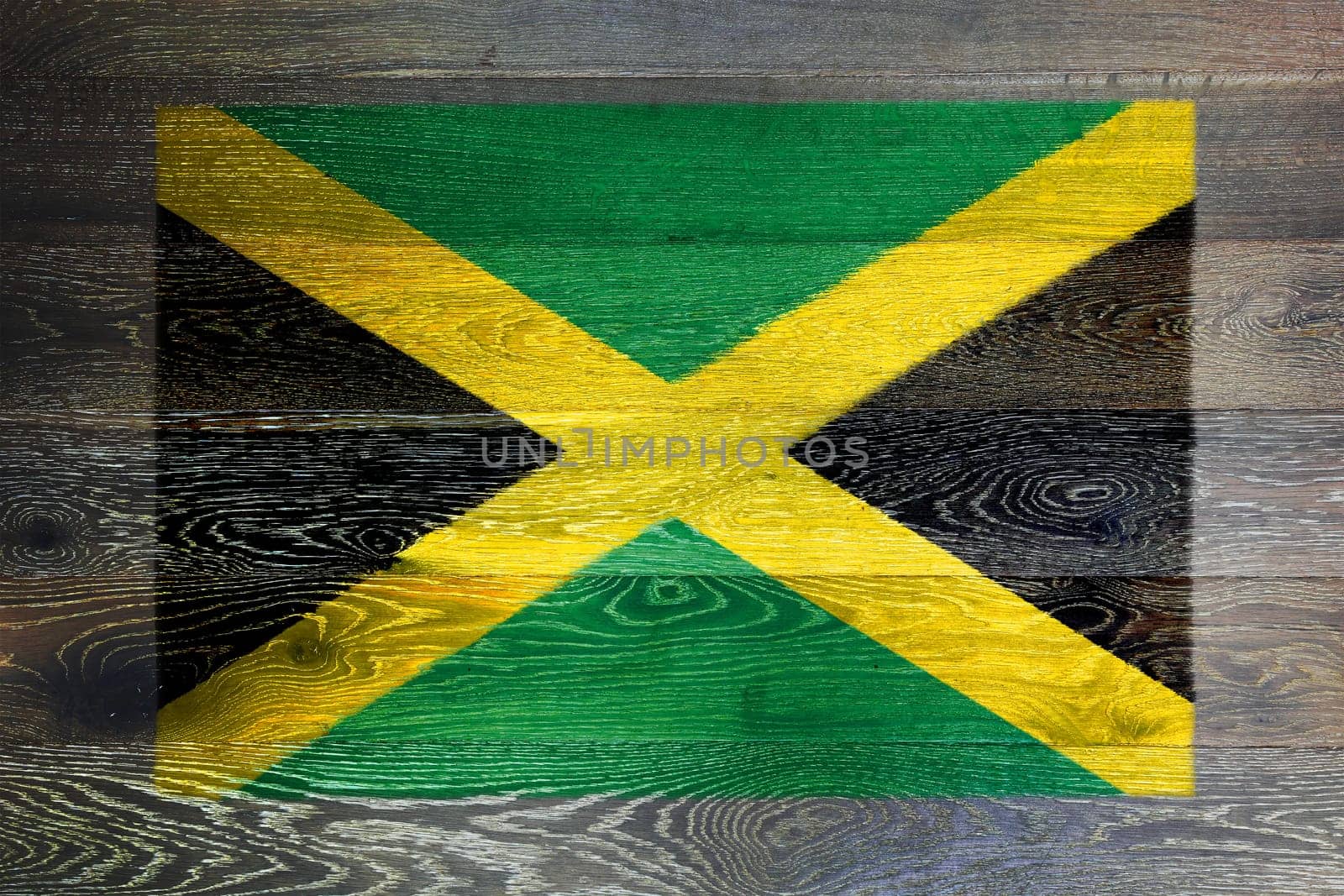 A Jamaica flag on rustic old wood surface background
