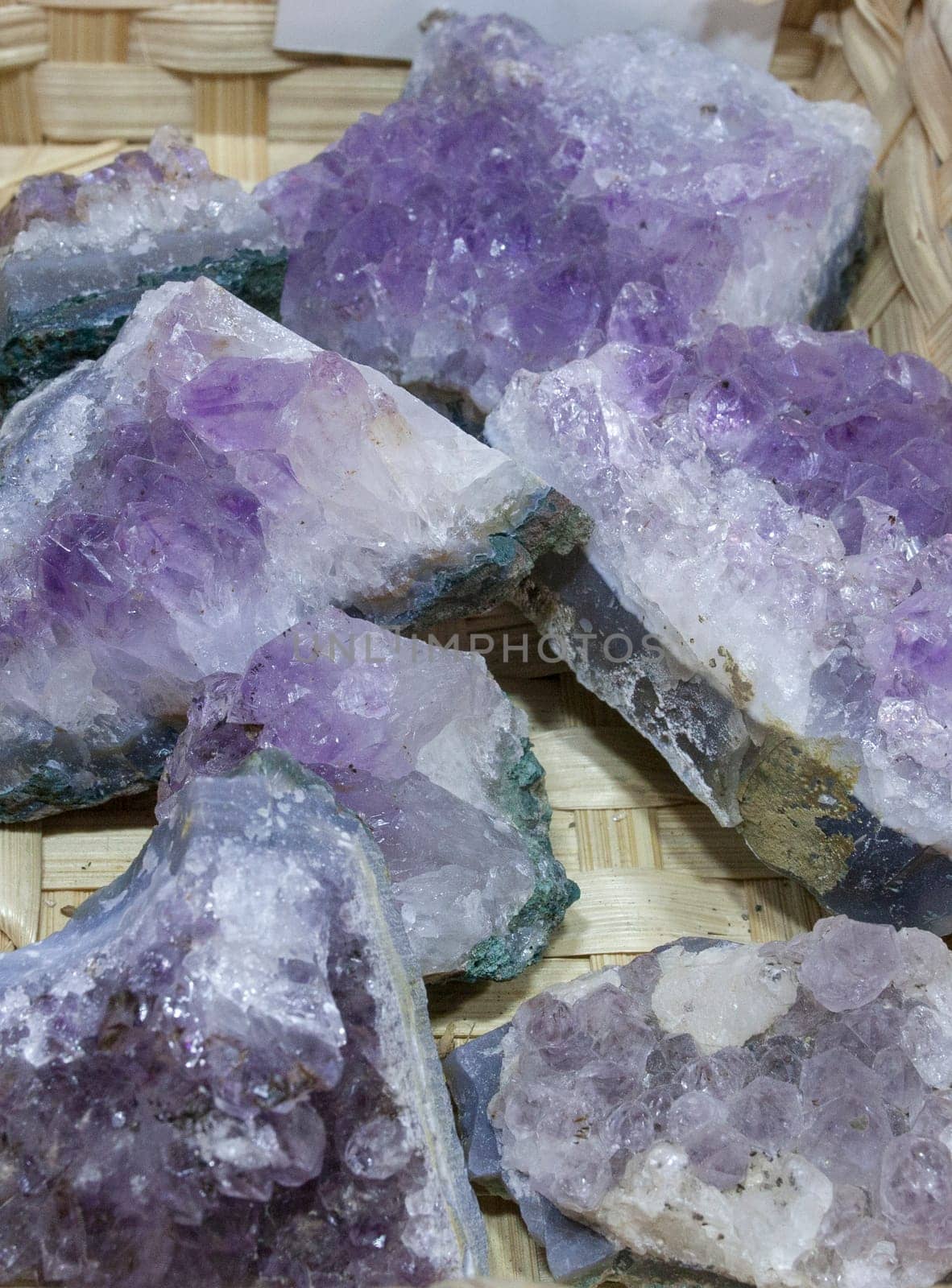 Amethyst Fragments, believed to have beneficial health properties. Displayed on basket at street market stall