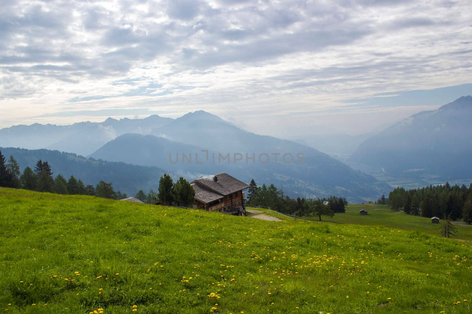 Landscape of Lienz Dolomites in Austria. Road and panorama of massive Alpine mountains. East Tyrol