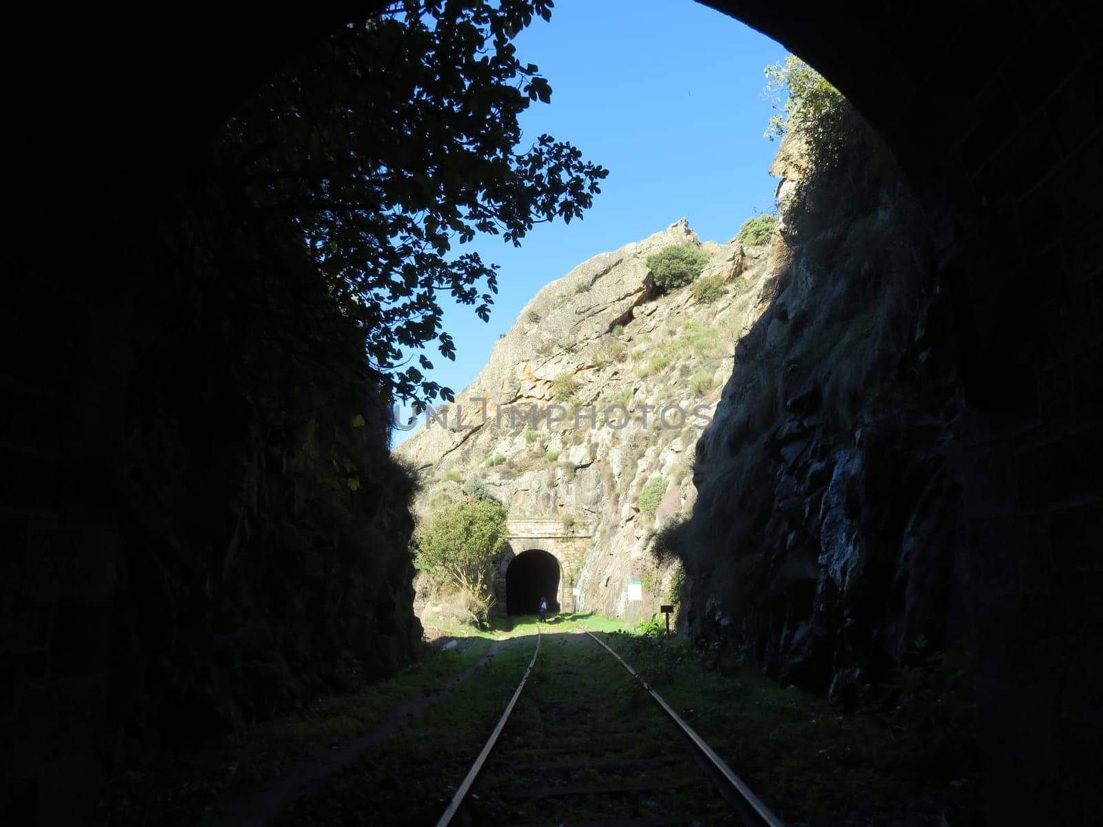 iron road bridges metal rail light at the end of the tunnel train transport
