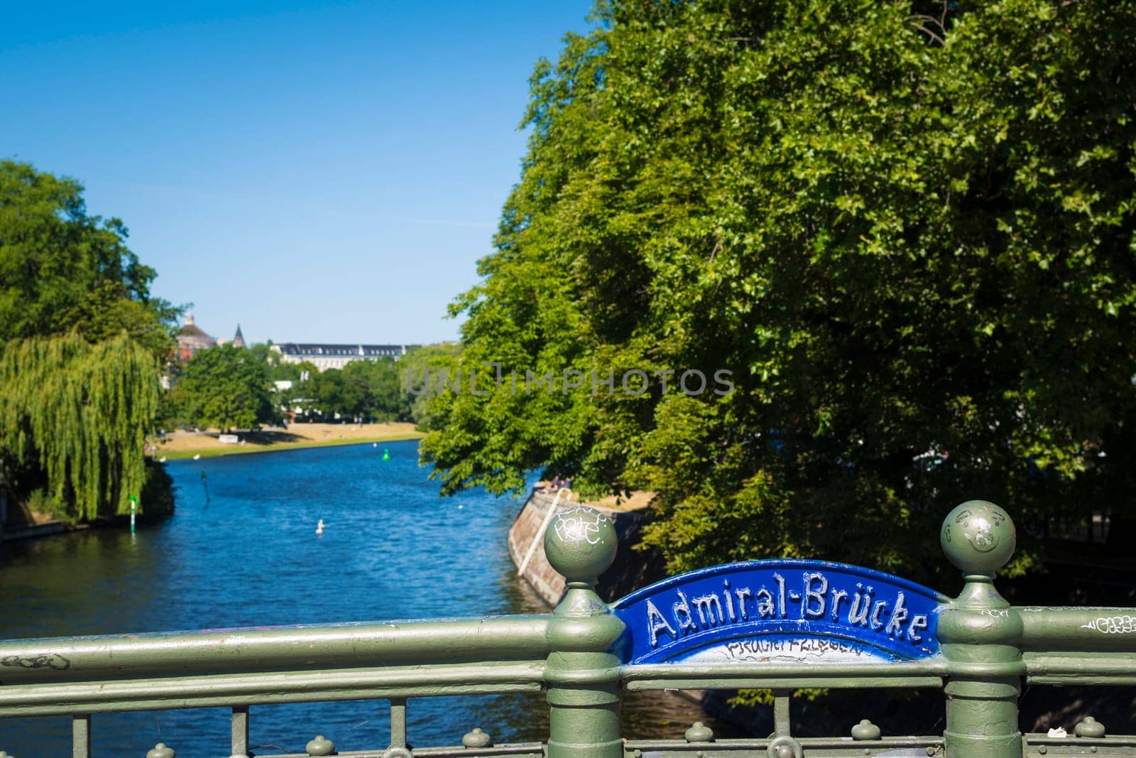 Berlin, Germany, June 2022: View from the Admiralbrucke bridge over the Landwehr canal on the border of Neukolln and Kreuzberg in Berlin
