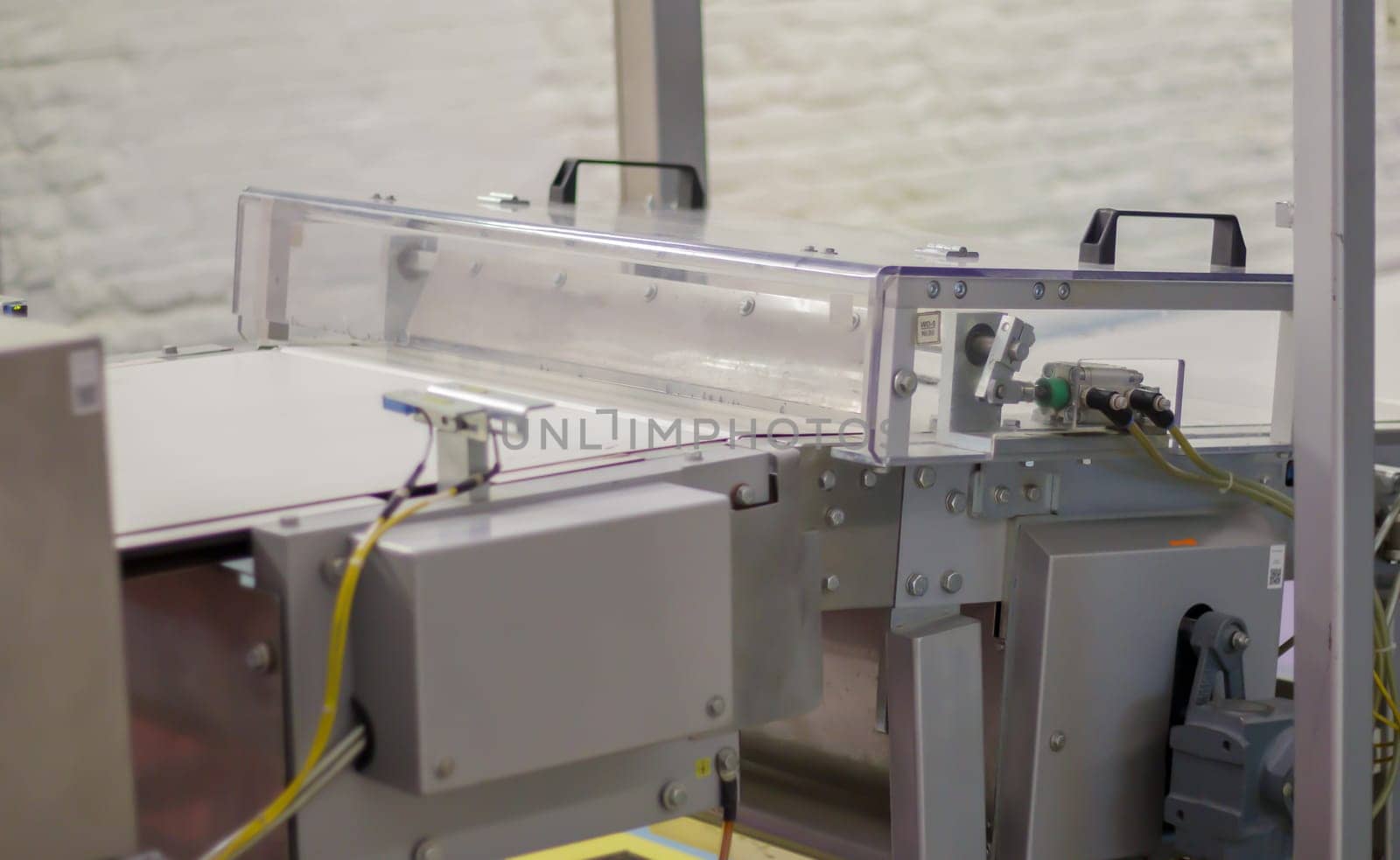 Factory for the production of sweets and chocolate. Automatic line for the production of chocolate in an industrial factory. Conveyor belt with sweets. Sweets production process. Food industry