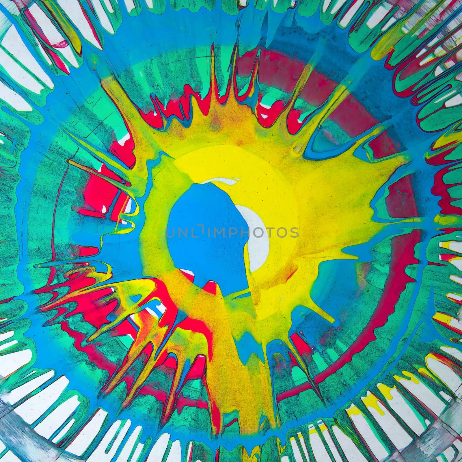 splatter splash real paint abstract sun centered spinning fluid vibrant green blue yellow red background messy splattered grunge style graphic design