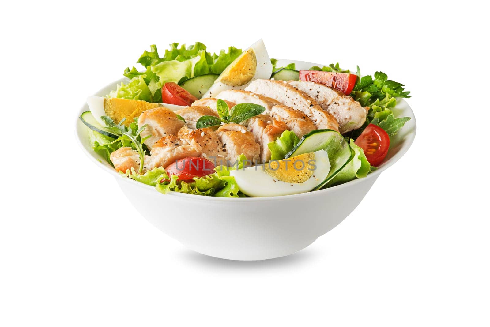 Fresh green salad with chicken breast and boiled egg isolated on white background