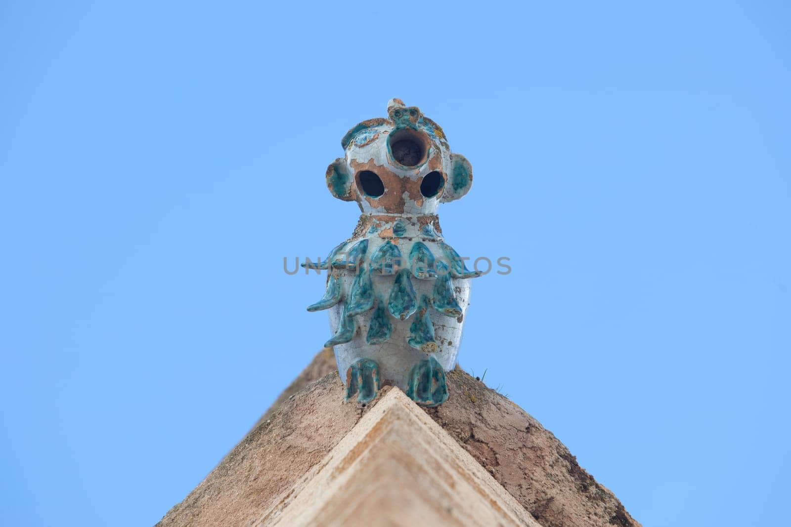 Porcelain gargoyle of Palace of Weathervanes, Caceres historic quarter, Extremadura, Spain