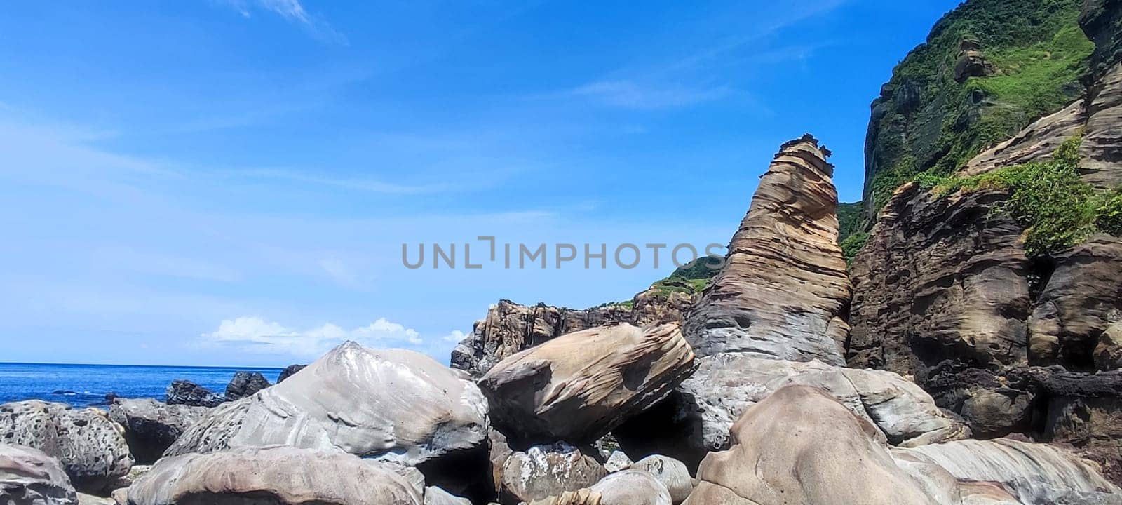 Nanya Strange Rocks, New Taipei City - Jul 27, 2022 : Strange rocks and rocks stretching hundreds of meters, can be said to be Bamboo Shoot Rock, Ice Cream Rock, Sea Dog Rock, etc. in the Natural Geology Classroom, Xinshi, Taiwan