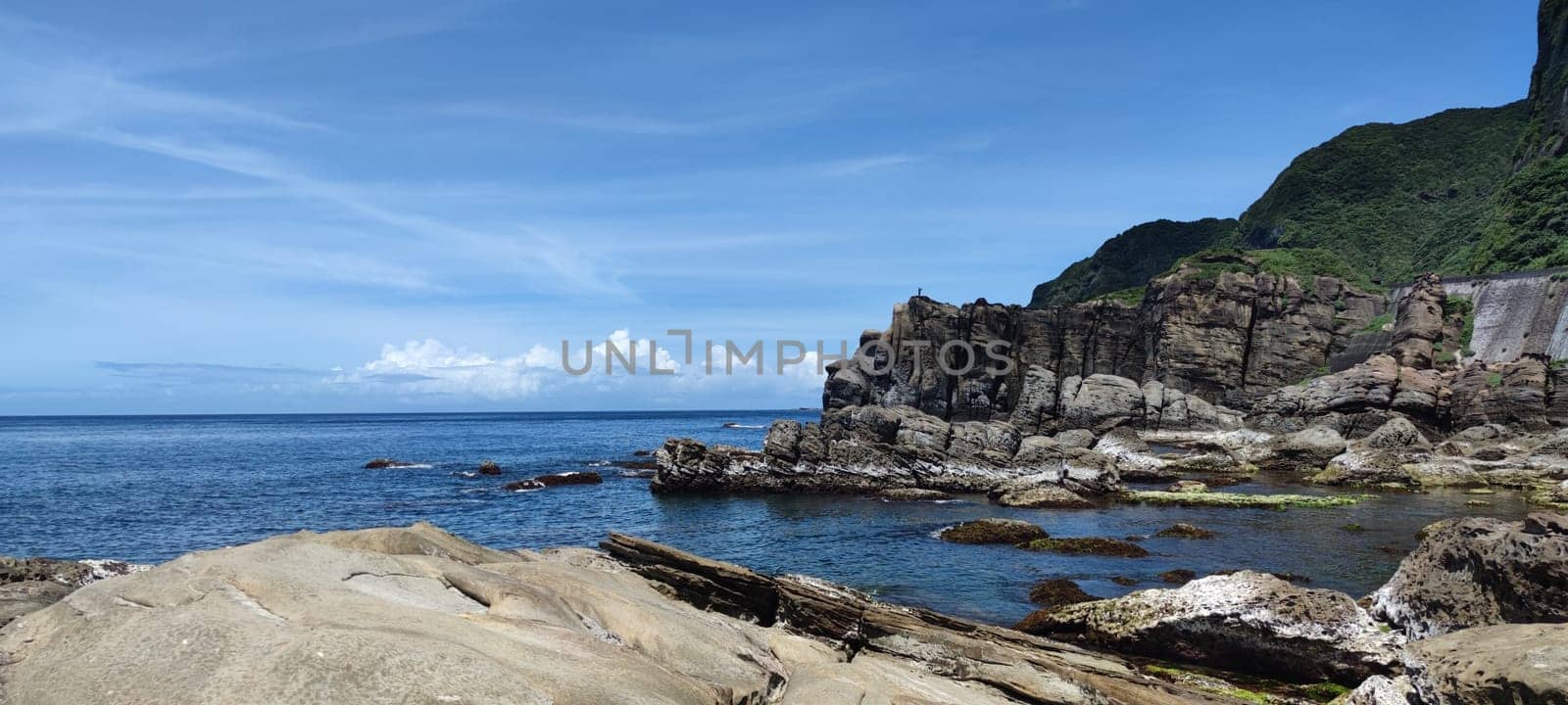 Nanya Strange Rocks, New Taipei City - Jul 27, 2022 : Strange rocks and rocks stretching hundreds of meters, can be said to be Bamboo Shoot Rock, Ice Cream Rock, Sea Dog Rock, etc. in the Natural Geology Classroom, Xinshi, Taiwan