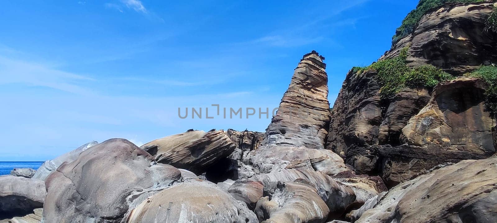 Nanya Strange Rocks, New Taipei City - Jul 27, 2022 : Strange rocks and rocks stretching hundreds of meters, can be said to be Bamboo Shoot Rock, Ice Cream Rock, Sea Dog Rock, etc. in the Natural Geology Classroom, Xinshi, Taiwan