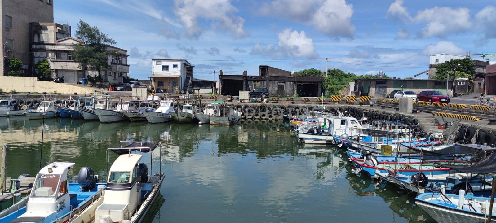 Gongliao Fishing Port, New Taipei City - Jul 27, 2022 : Located in Gongliao District and Miri Longdong Bay, surrounded by mountains on three sides and only facing the sea in the northeast to form a natural small bay, New Taipei City, Taiwan