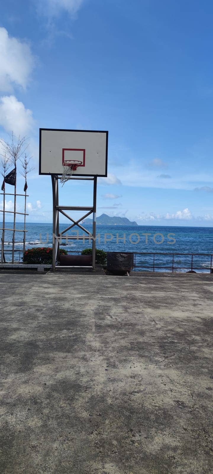 Daxi Daan Temple front basketball court, Yilan County - Jul 27, 2022 : Daxi Daan Temple front basketball court! Sitting on the dreamy sea view of Guishan Island, Yilan County, Taiwan