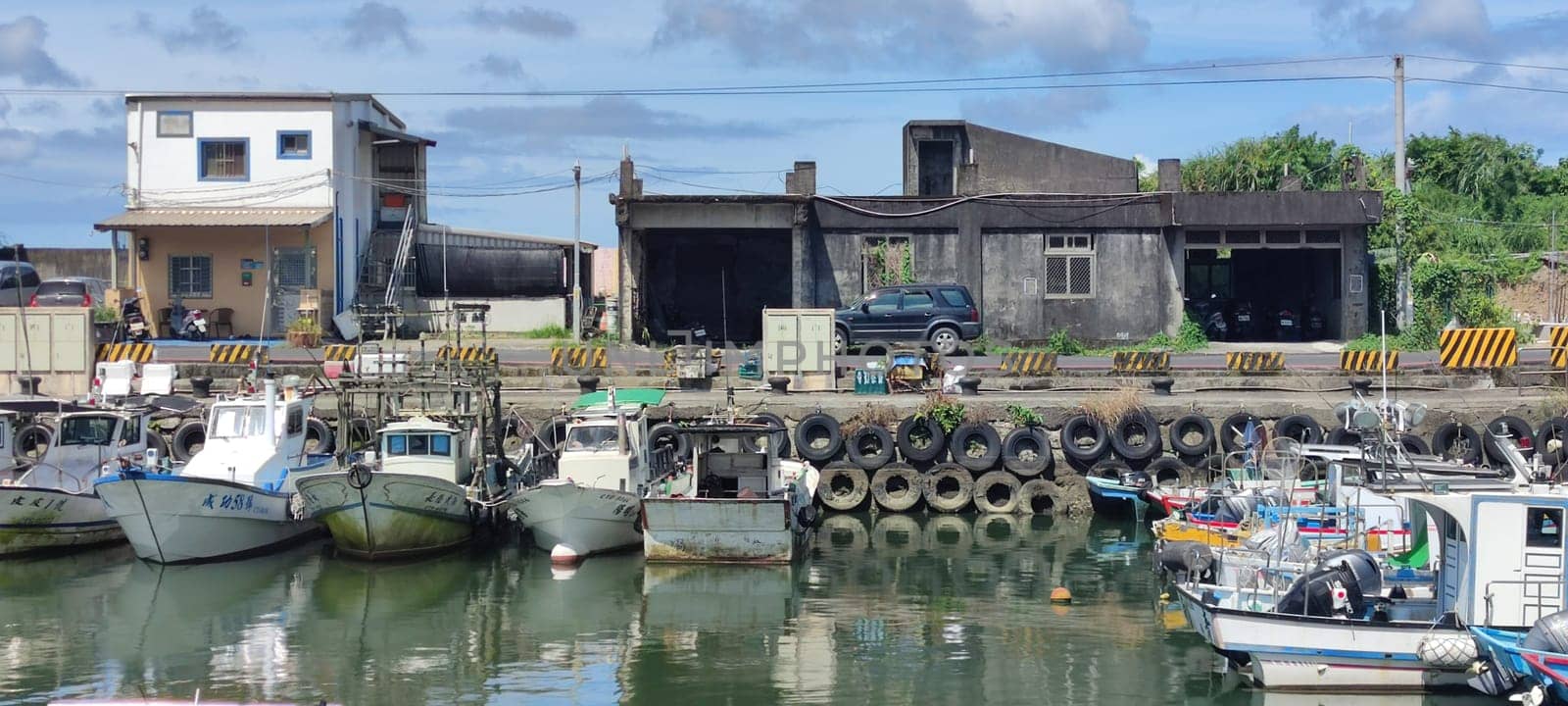 Gongliao Fishing Port, New Taipei City - Jul 27, 2022 : Located in Gongliao District and Miri Longdong Bay, surrounded by mountains on three sides and only facing the sea in the northeast to form a natural small bay, New Taipei City, Taiwan