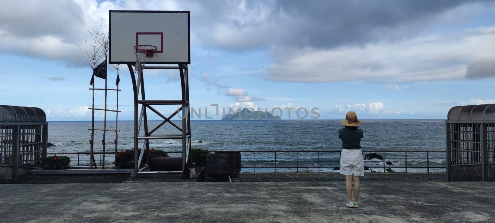 Daxi Daan Temple front basketball court, Yilan County - Jul 27, 2022 : Daxi Daan Temple front basketball court! Sitting on the dreamy sea view of Guishan Island, Yilan County, Taiwan