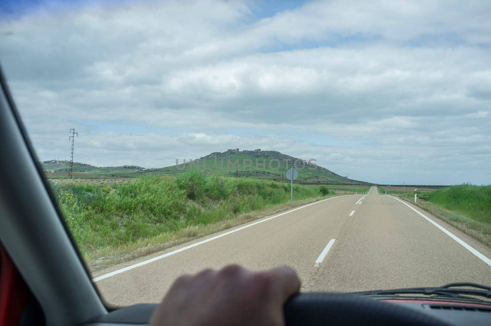 Approaching to Magacela town from EX-348 road. View from the inside of the car