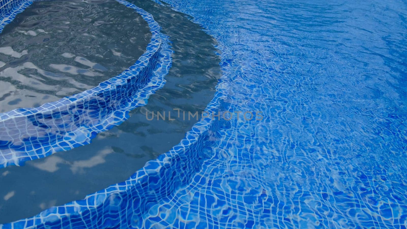swimming pool step, view of beautiful swimming pool material detail and decoration design.