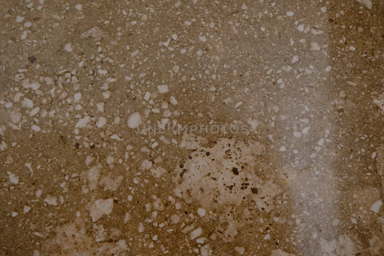 A natural stone. Pale biege marble. Background. Texture Close up