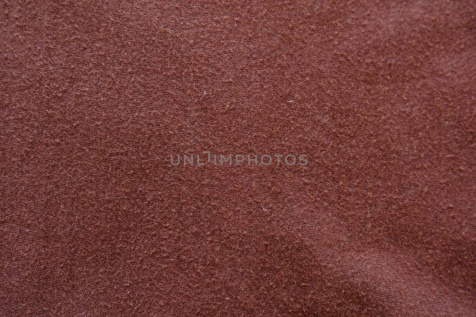 brown textile texture, can be used as background.