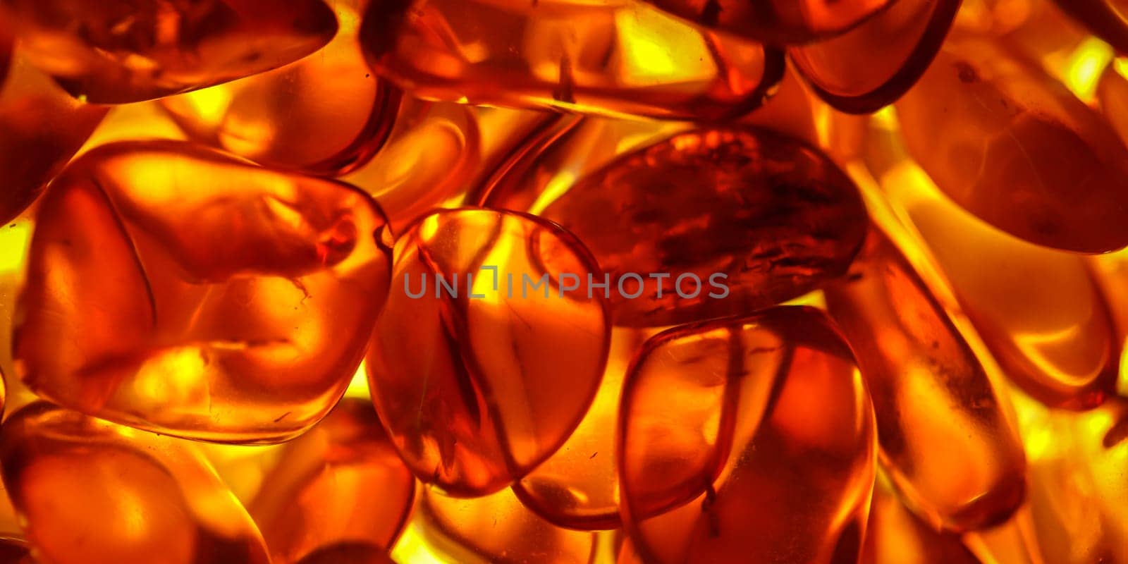 The warm color of amber. Close up of amber.