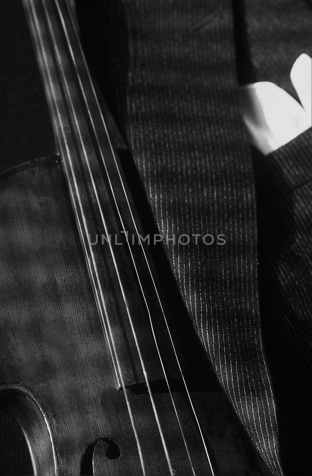 old violin with men's jacket