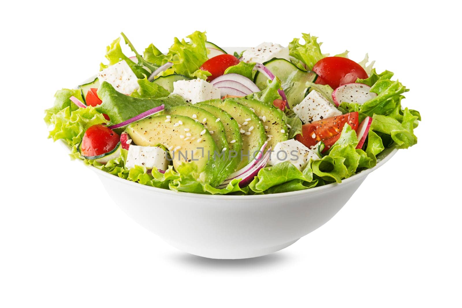 Healthy green salad with avocado feta cheese and fresh vegetables isolated on white
