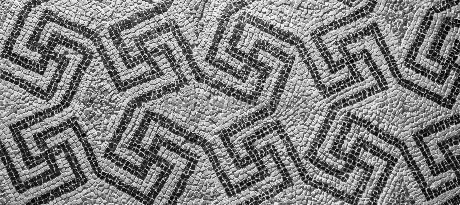 Swastika symbol in ancient Celtic mosaic decoration. Design for an old style background.