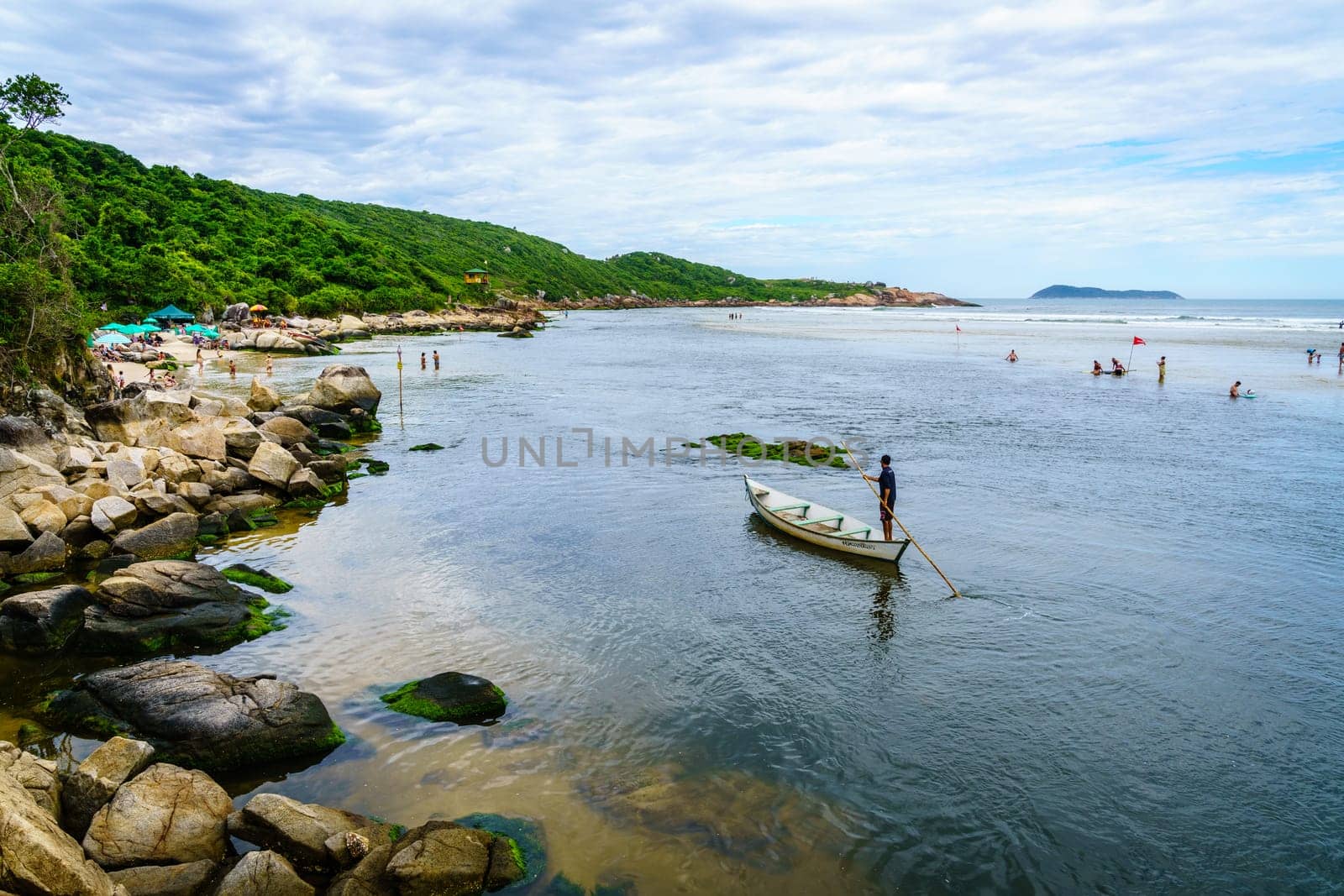 Guarda do Embau, January 14, 2022: Rio da Madre separating Praia Guarda do Embau beach from the mainland