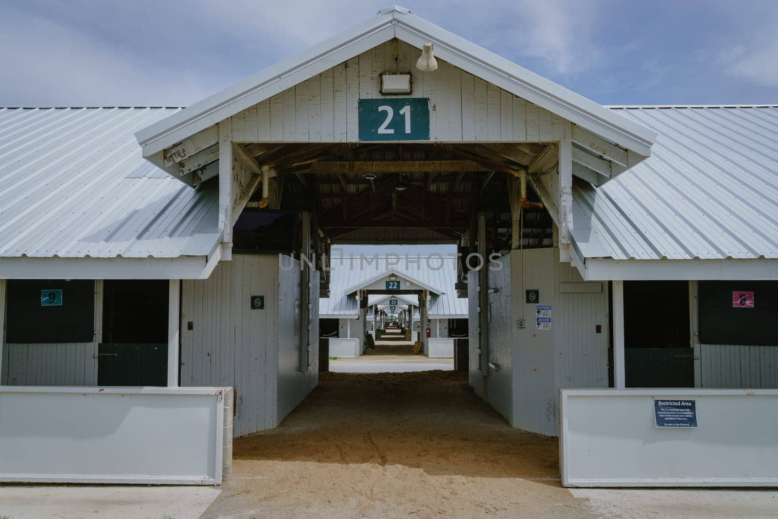 April 17, 2022, Lexington, Kentucky: Row of horse stables at Keeneland Race Track in Lexington, Kentucky