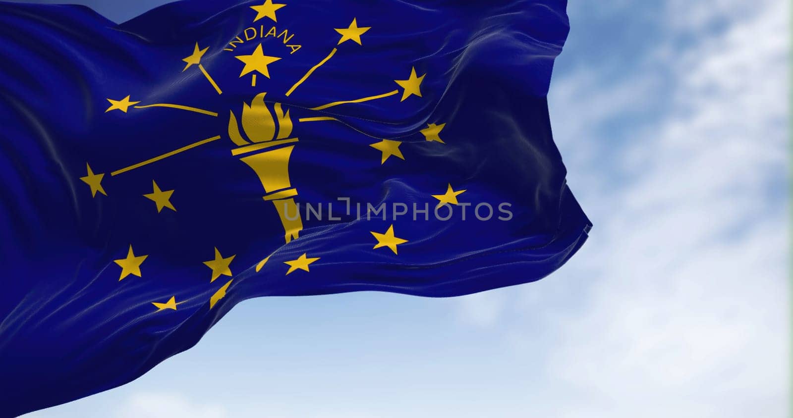 The US state flag of Indiana waving in the wind. Indiana is a U.S. state in the Midwestern United States. Democracy and independence.