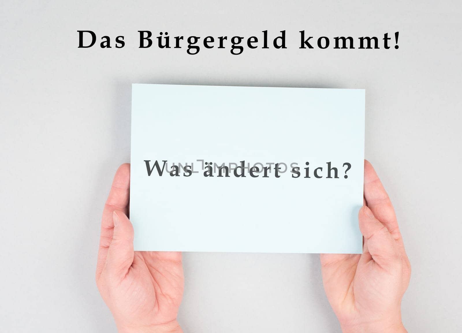 The german word for citizen money is standing on a paper, new financial help system for unemployment in Germany, social issue