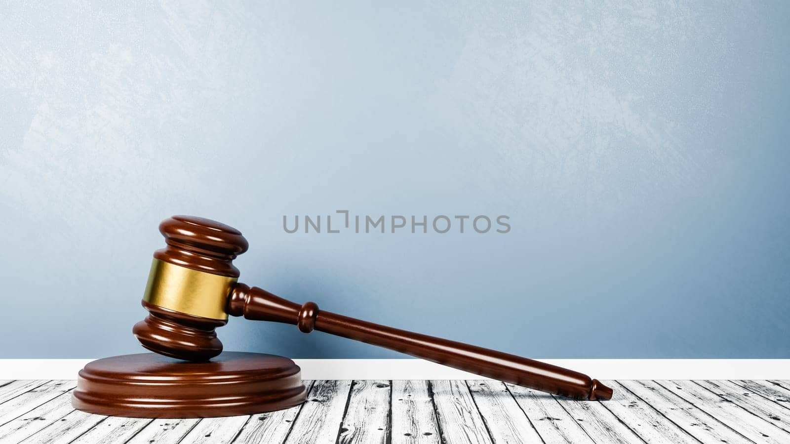 Judge's Gavel on Wooden Floor Against Blue Wall with Copy Space 3D Render Illustration