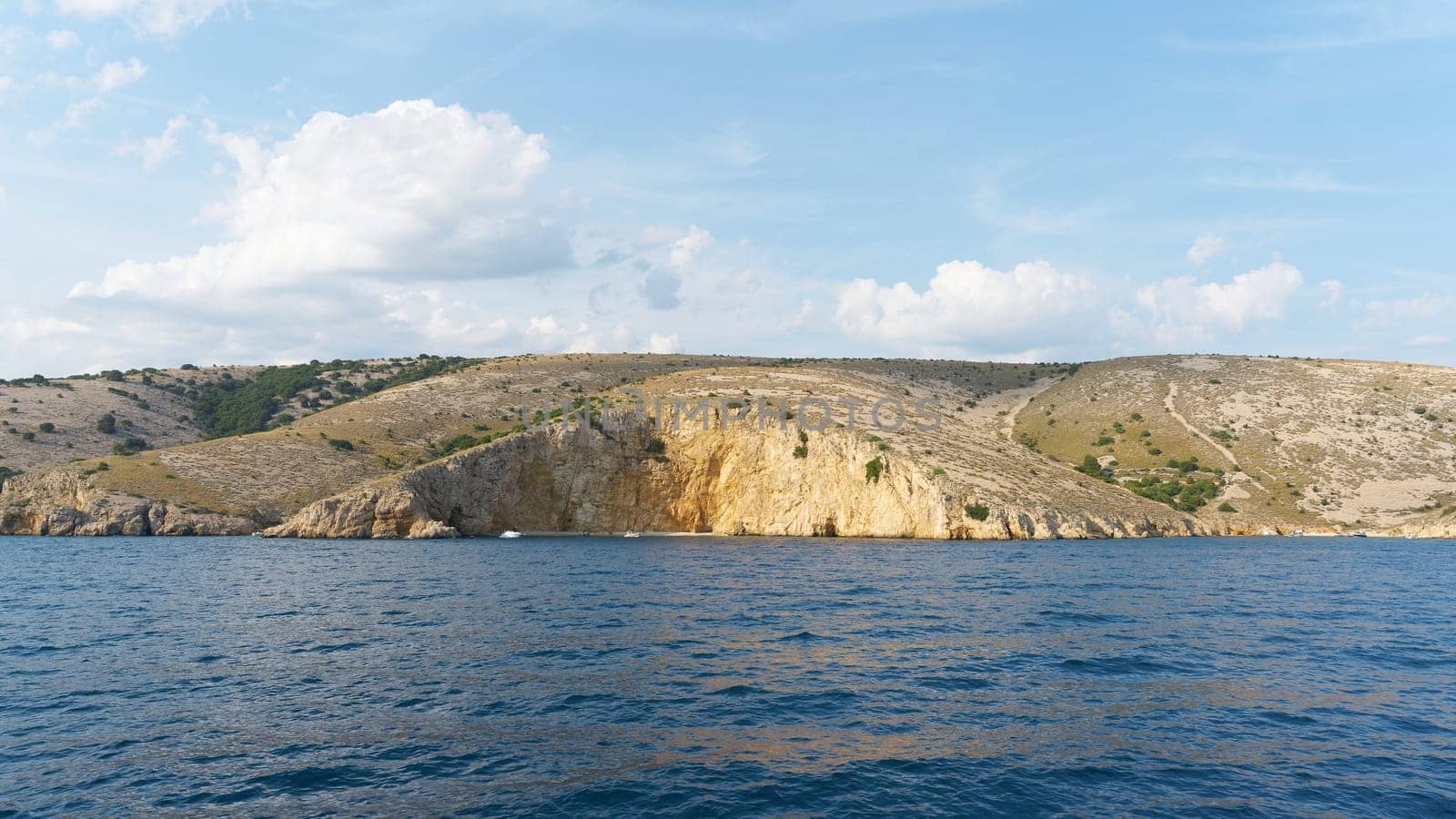 popular bathing cove Golden Beach also known as Zlatna Plaža, Plaža Biškupići, Velo Čelo, near Krk in Croatia