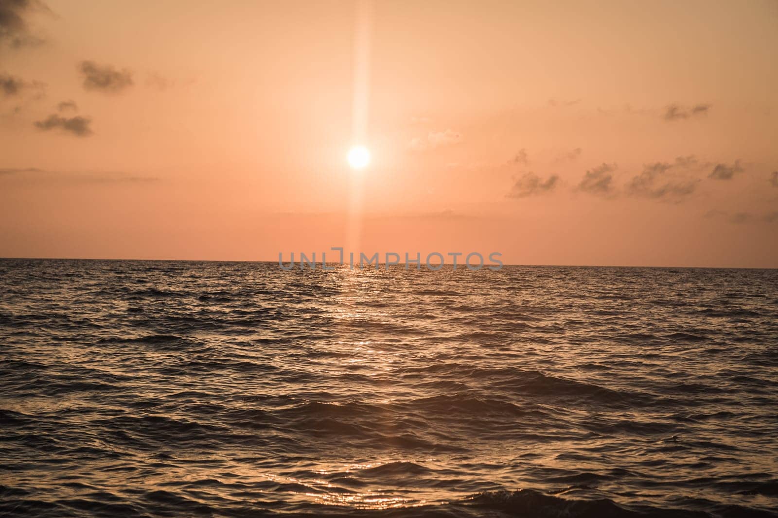 Beautiful bright purple sunrise on the ocean