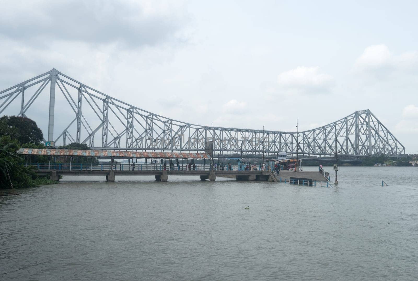 The Howrah Bridge, a balanced attached cantilever bridge covering over the Hooghly River in West Bengal, India, South Asia Pacific June 28, 2022