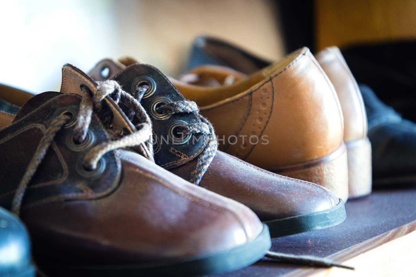 Old shoes at an historic shoemakers workplace