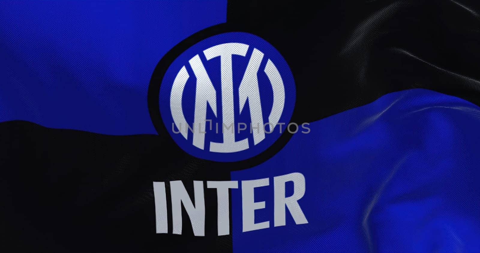 Milan, Italy, July 2022: The flag of Inter Football Club waving in the wind. Inter is a professional football club based in Milan, Italy