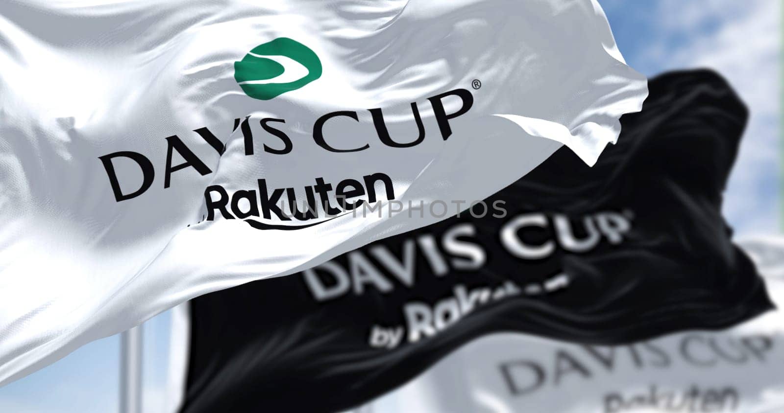 Bologna, Italy, July 2022: the flags of the Davis Cup by Rakuten waving in the wind on a clear day. The Davis Cup is the premier international team event in men's tennis