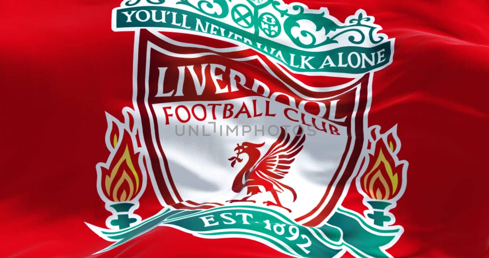 Liverpool, UK, July 2022: The flag of Liverpool Football Club waving. Liverpool F.C. is a professional football club based in Liverpool, England