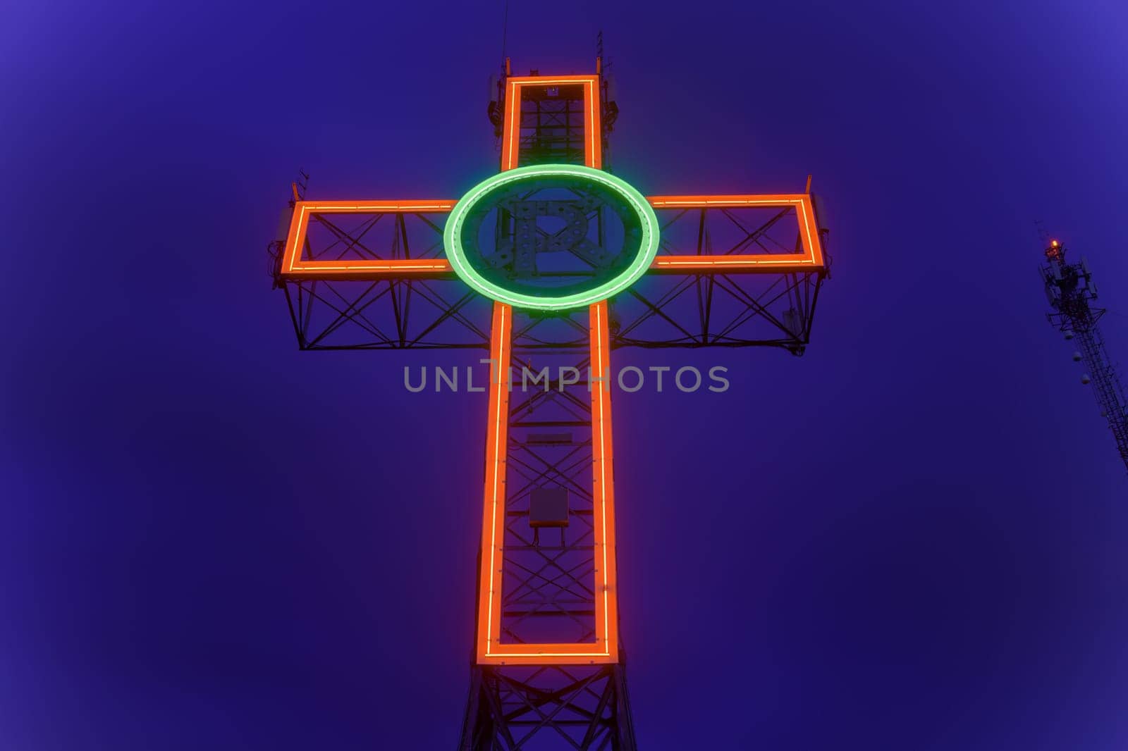 Mont-Bellevue Sherbrooke Canada peace cross monument illuminated at night red and green neon on blue sky Estrie Quebec Eastern Townships christian religion symbol