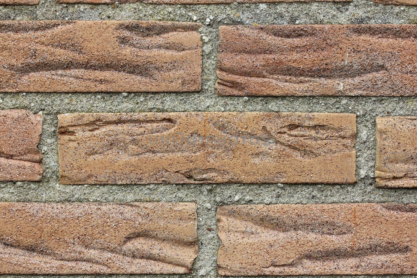 A detailed illustration of red bricks with gray fugue.Eine detaillierte Darstellung von roten Backsteinen mit grauen Zwischenräumen.