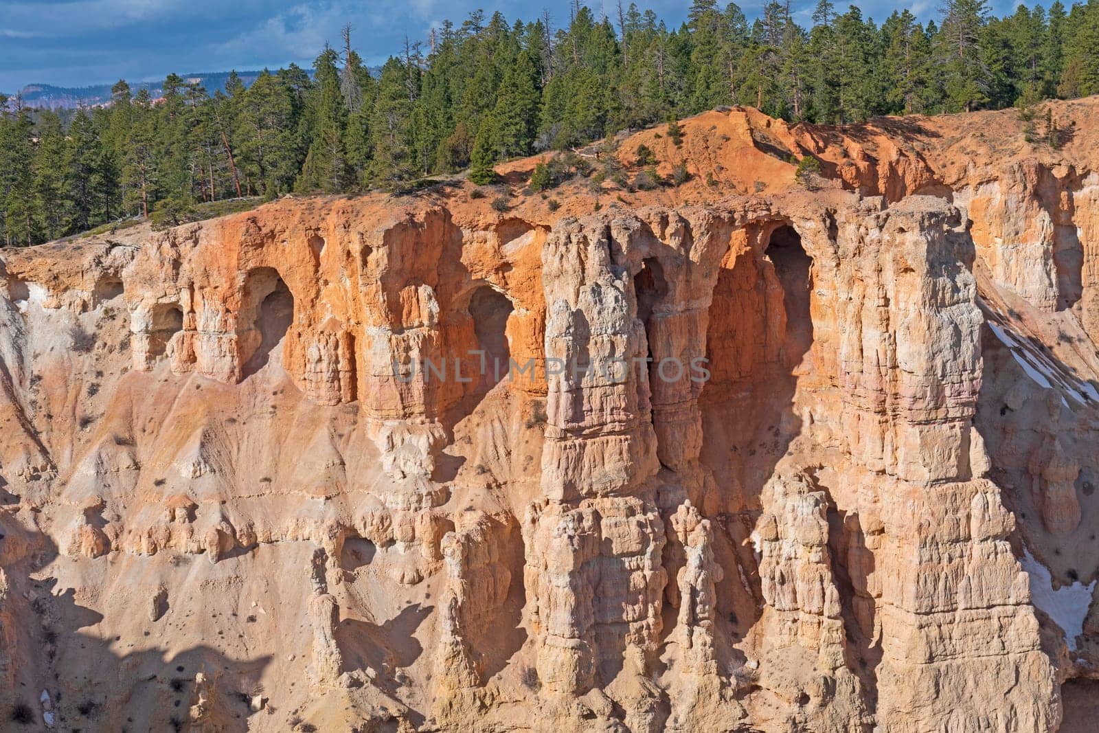 Natural Bridges Forming in a Sandstone Cliff in Bryce Canyon National Park in Utah