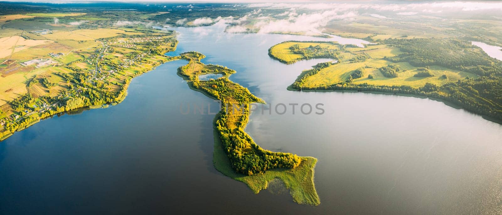 Lyepyel District, Lepel Lake, Beloozerny District, Vitebsk Region. Aerial View Of Residential Area With Houses In Countryside. Top View Of Island From High Attitude In Autumn Morning. Bird's Eye View Of Old Lyepyel Cityscape Skyline. Panoramic View