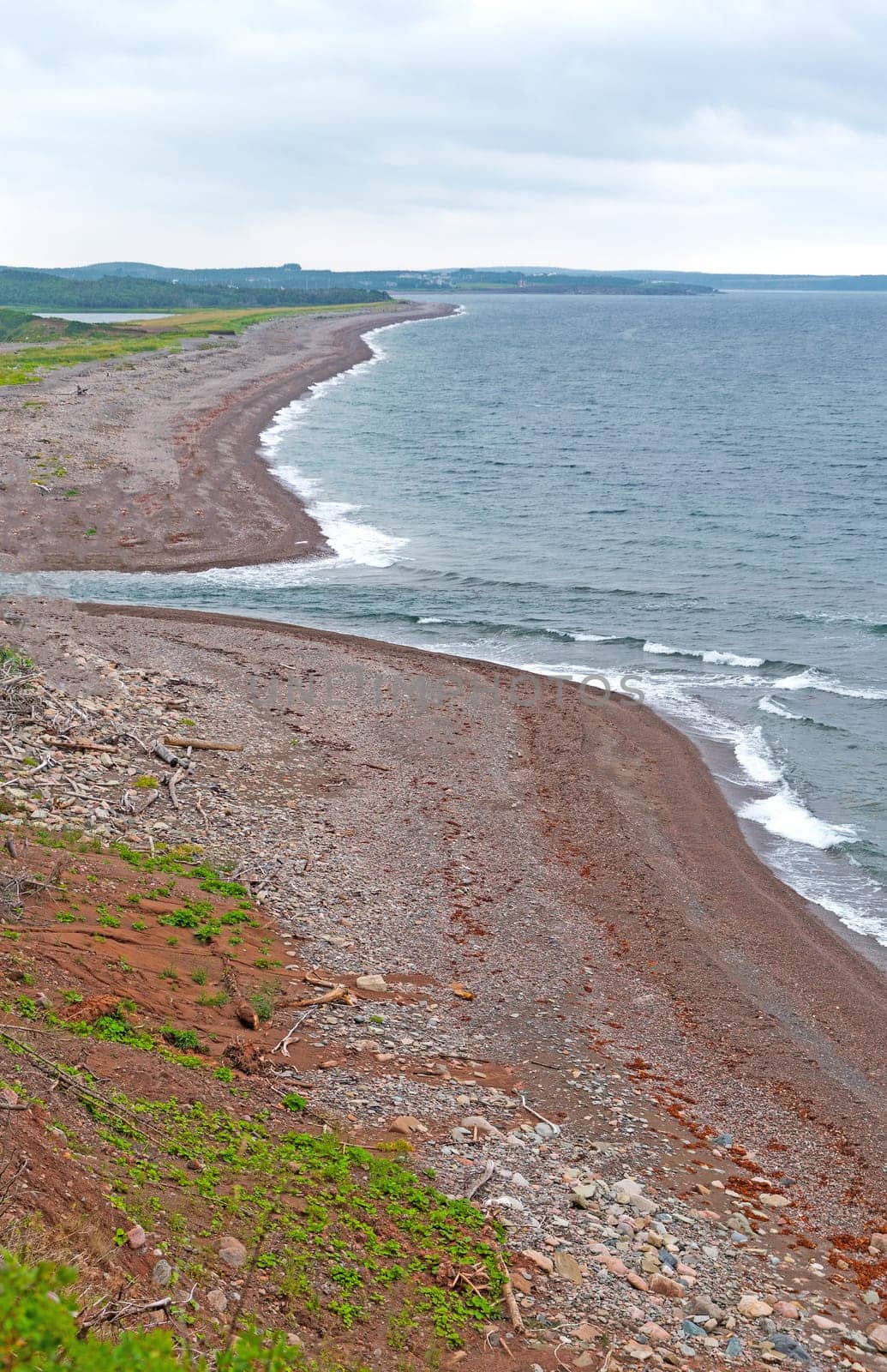 River Emptying Into the Ocean on a Quiet Beach on Petit Etang Beach in Cape Breton Highland National Park in Canada