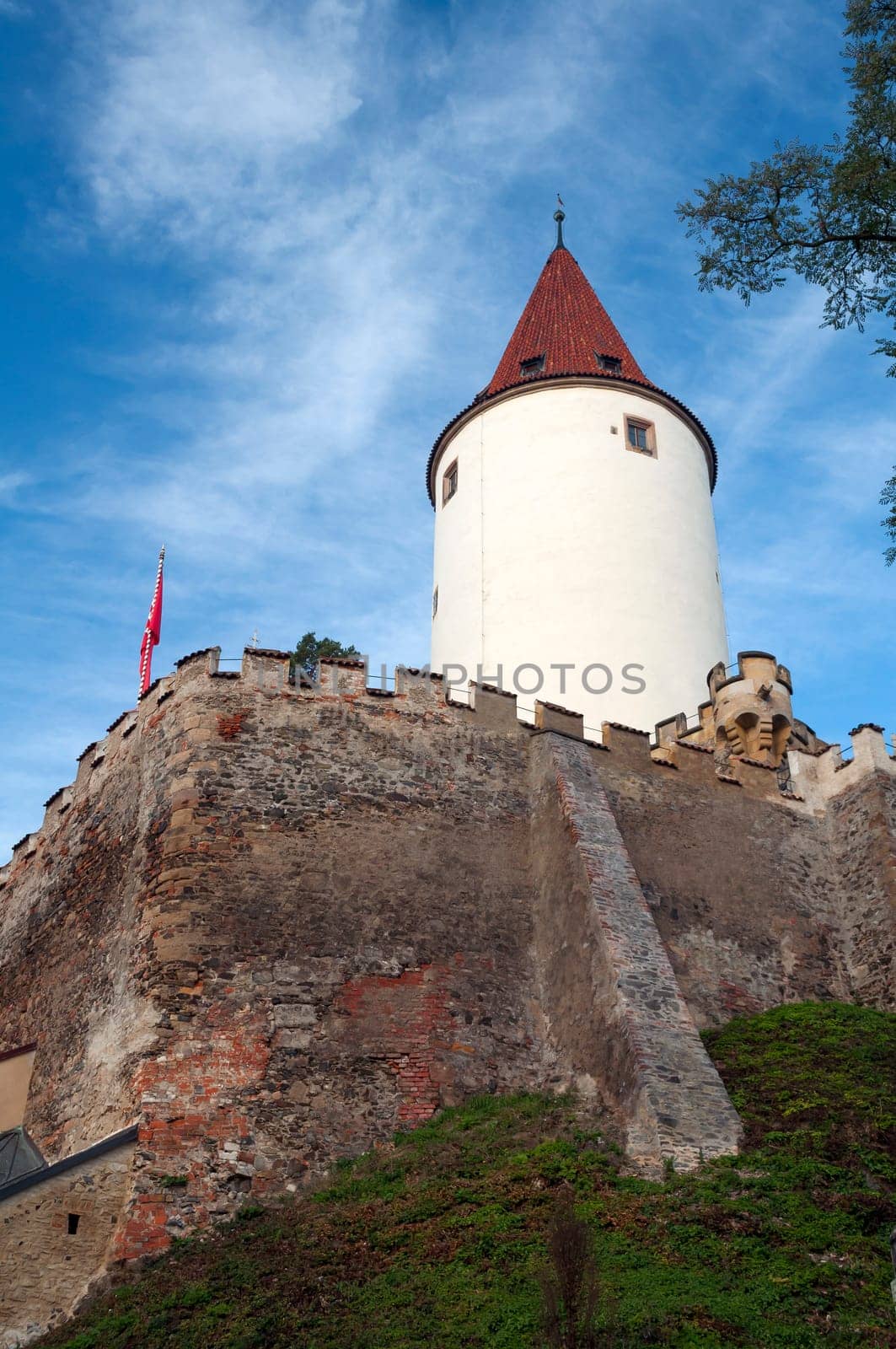 Medieval castle tower and defensive wall in Central Bohemia, Czech Republic.