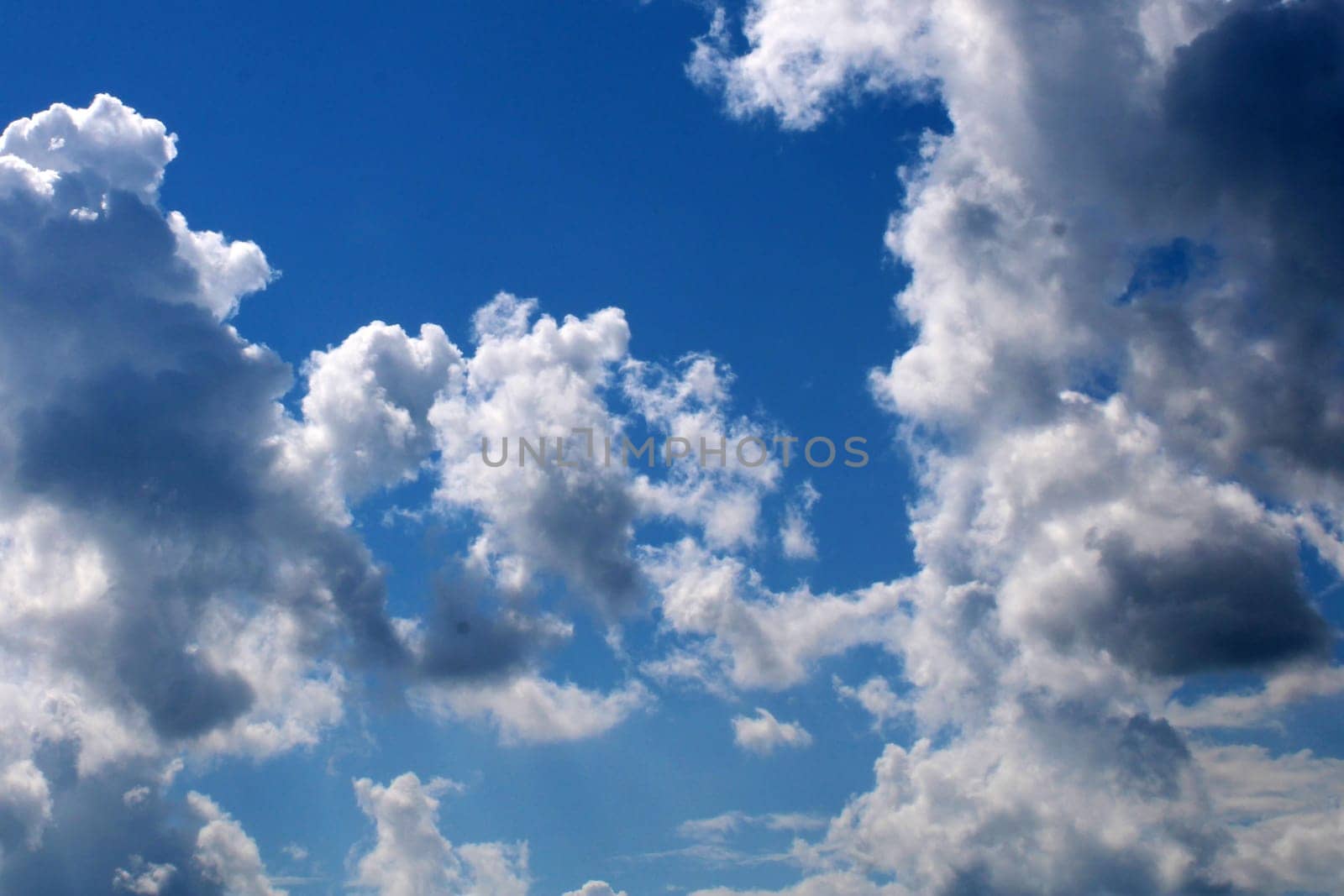 An approaching storm. Beautiful storm clouds on the blue sky..