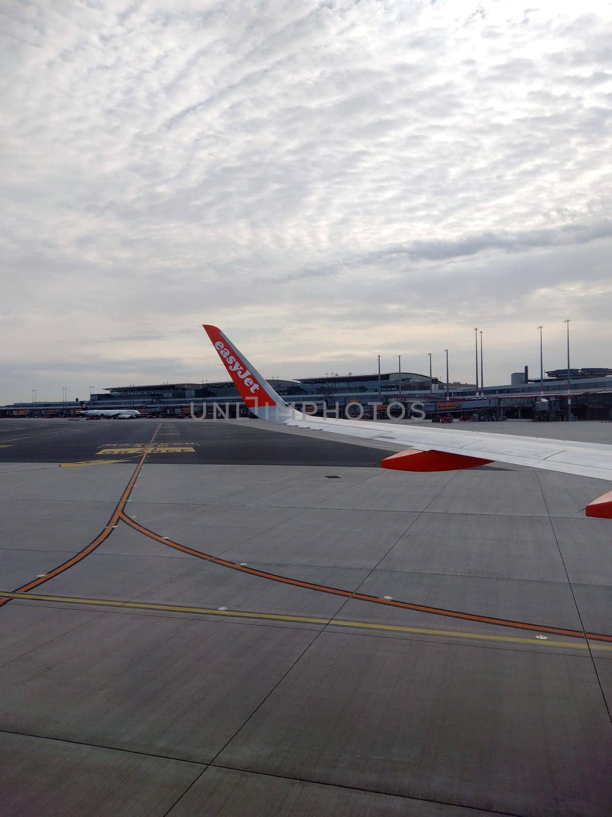 An EasyJet aircraft at Euro Airport Basel-Mulhouse is being prepared for take-off. - Theme picture - Travel photography