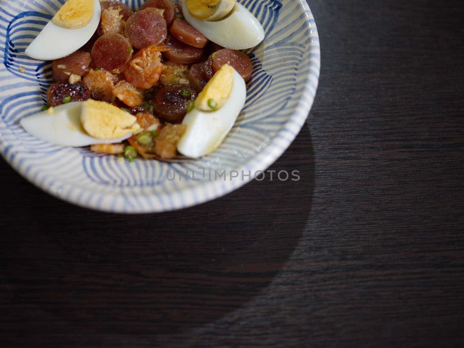 Spicy Chinese pork sausage with boiled egg Thai salad