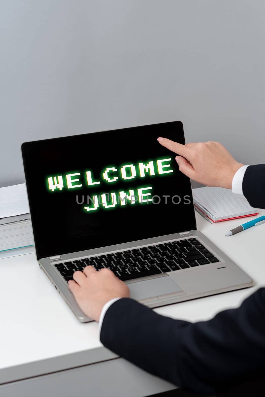 Text caption presenting Welcome June, Word for Calendar Sixth Month Second Quarter Thirty days Greetings Woman Typing Updates On Lap Top And Pointing New Ideas With One Finger.