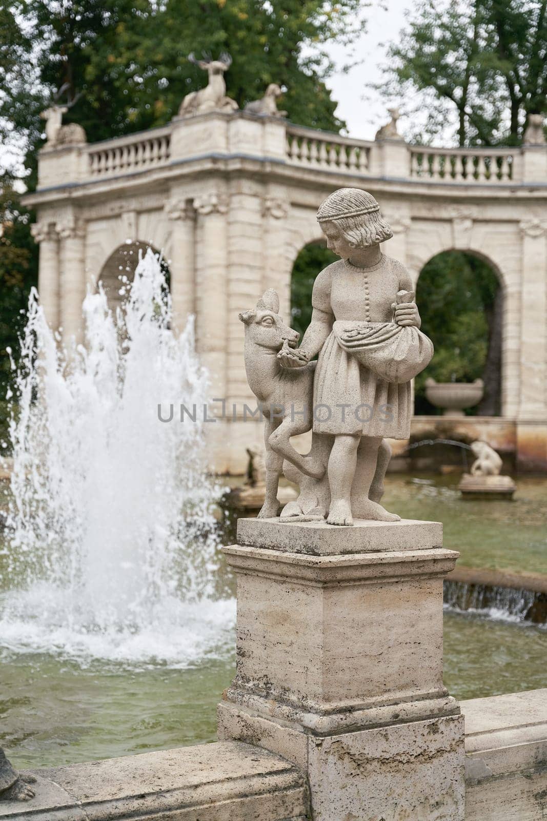 Figures from the fairy tale Brüderchen und Schwesterchen at the Märchenbrunnen fairy tale fountain from 1913 in the popular Volkspark Friedrichshain in Berlin
