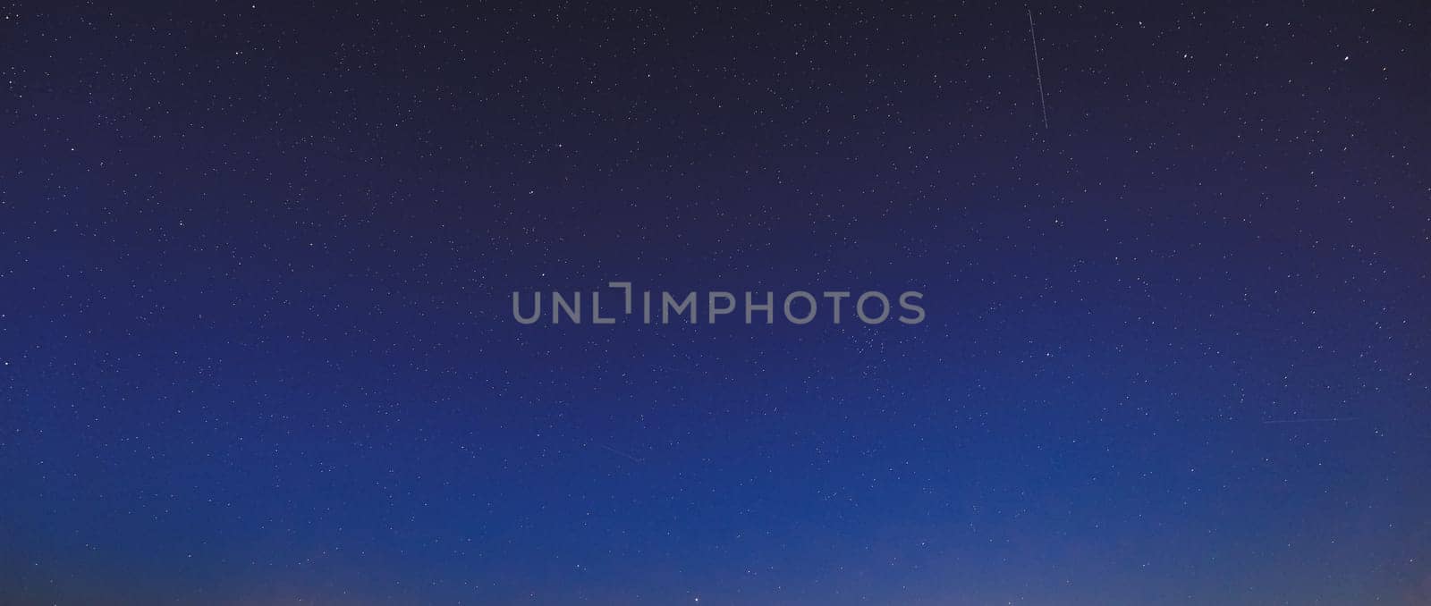 Real Night Sky Stars. Natural Starry Sky Blue Background Backdrop.