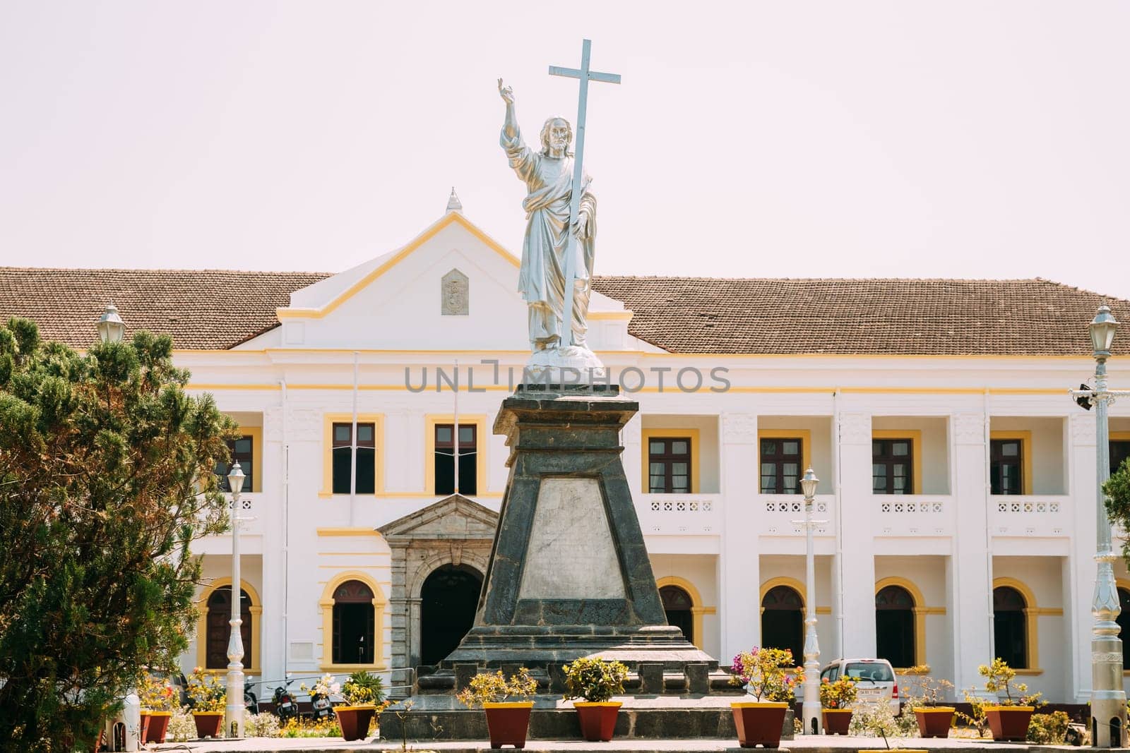 Panaji, India. Archbishop's Palace And Statue Of Jesus In Sunny Day. The residence of the archbishop.